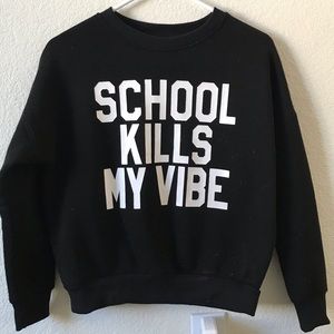 a long sleeve “school kills my vibe” sweater